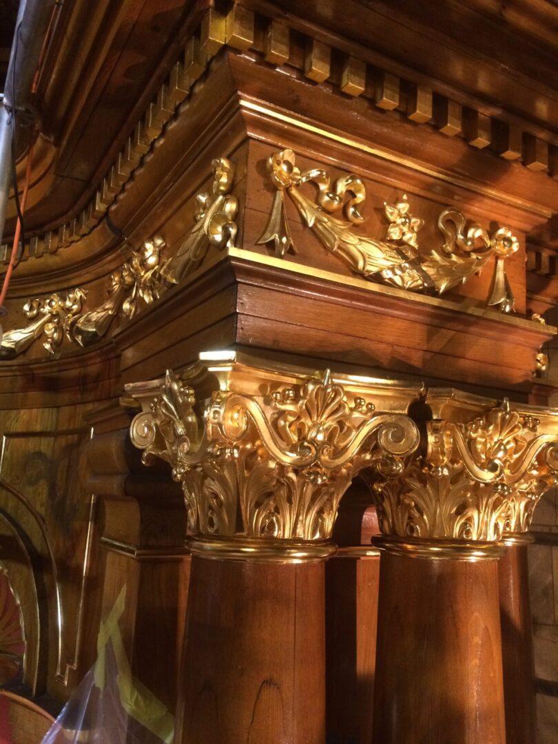 Column capitals after gilding conservation at St. Cantius Church in Chicago.