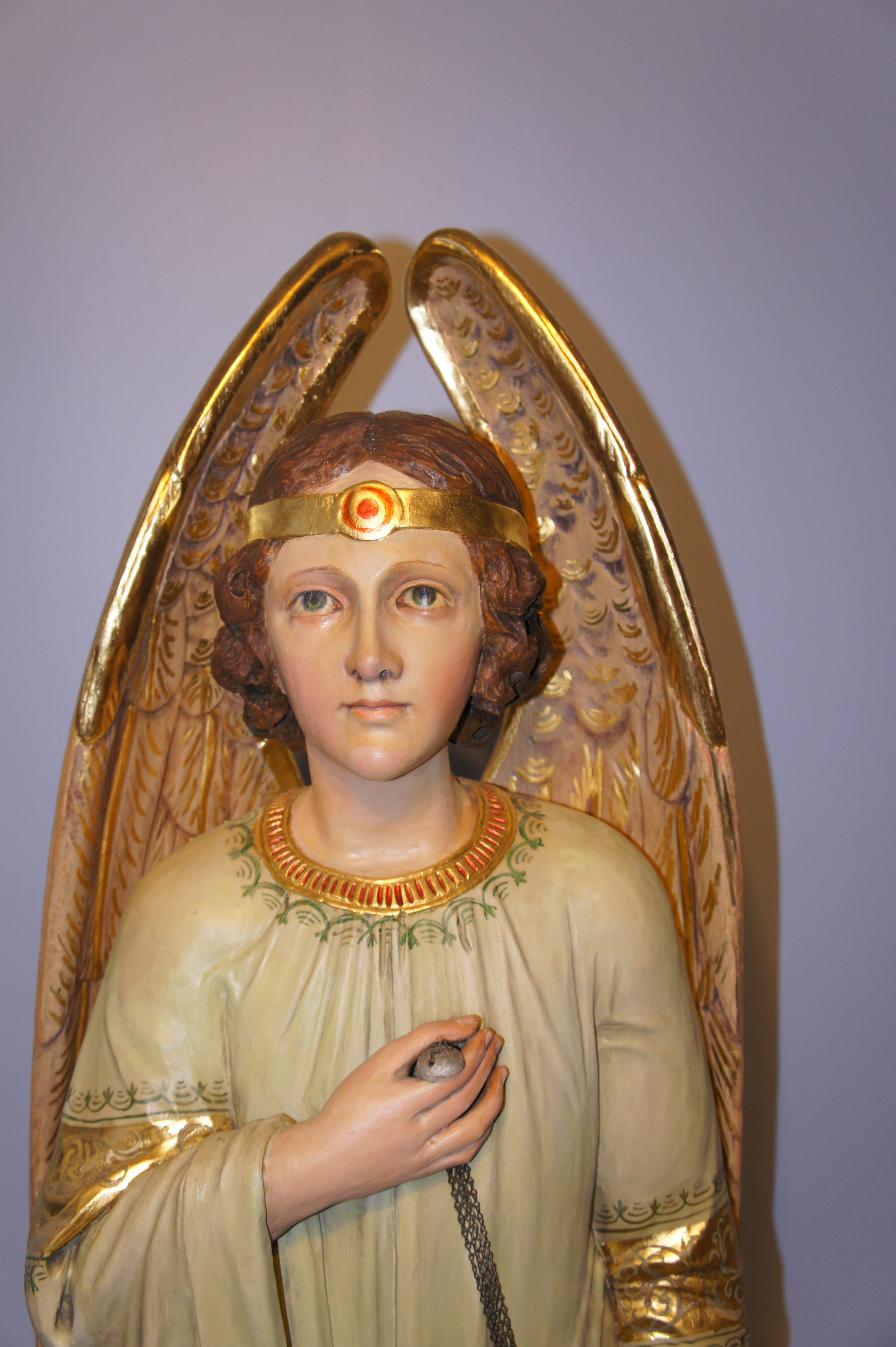 Angel after sculpture restoration and gilding