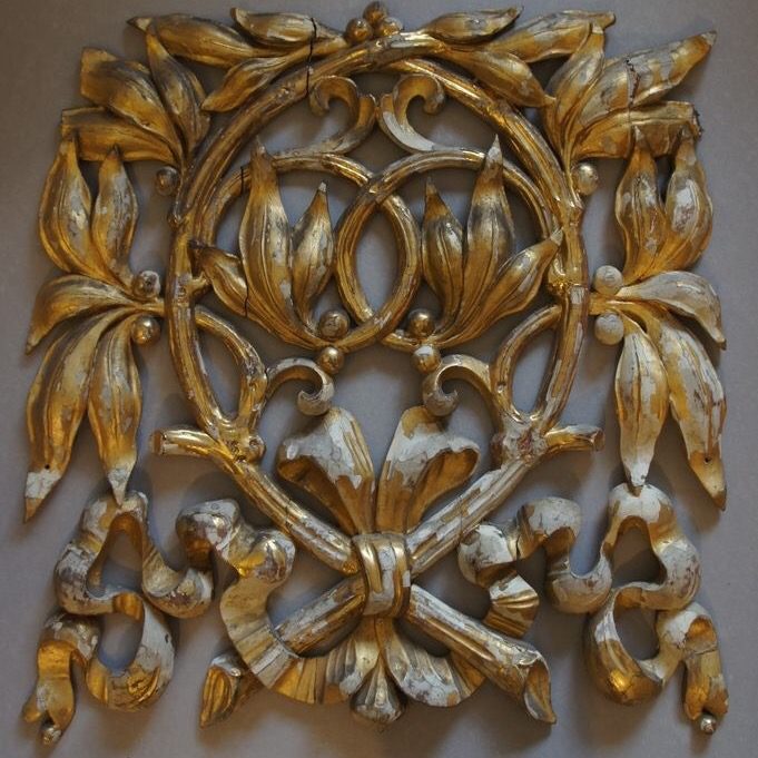 Full view of wooden ornament before gilding restoration