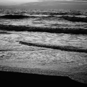 black and white picture of the sea shoreline